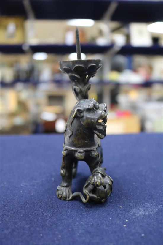 A Chinese bronze lion pricket candlestick, late Ming dynasty